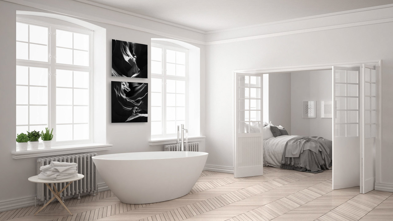 22 fine art prints of Antelope Canyon in black and white displayed in a bathroom.