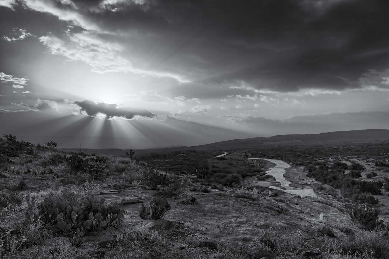 A black and white photo taken in the Big Bend region of South Texas with magical lights and contrasts.