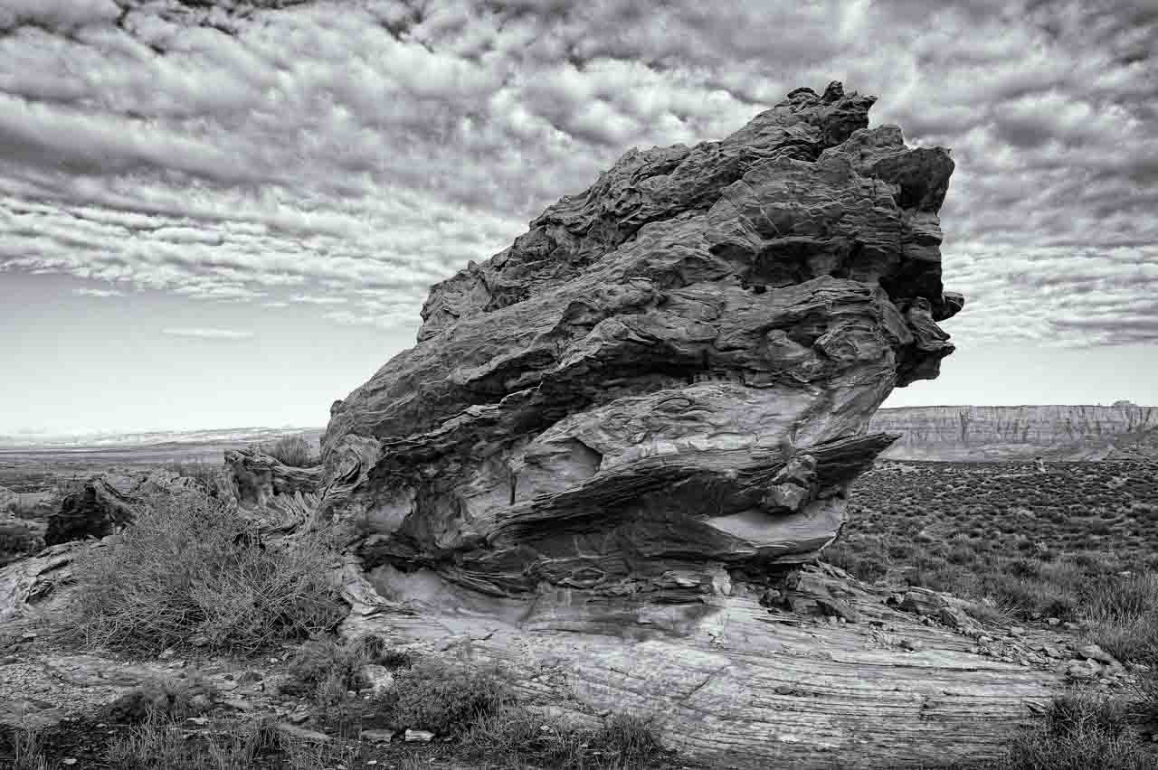 The negative space in this picture consists of the  space that we have created on either side of the rock. This technique enables  us to make the scene airy and let the composition breathe.