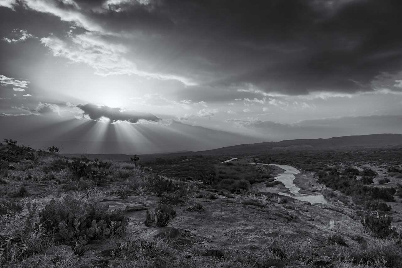 This black-and-white photograph of a Big Bend landscape in Texas was developed to hightlight the Rio Grande river.