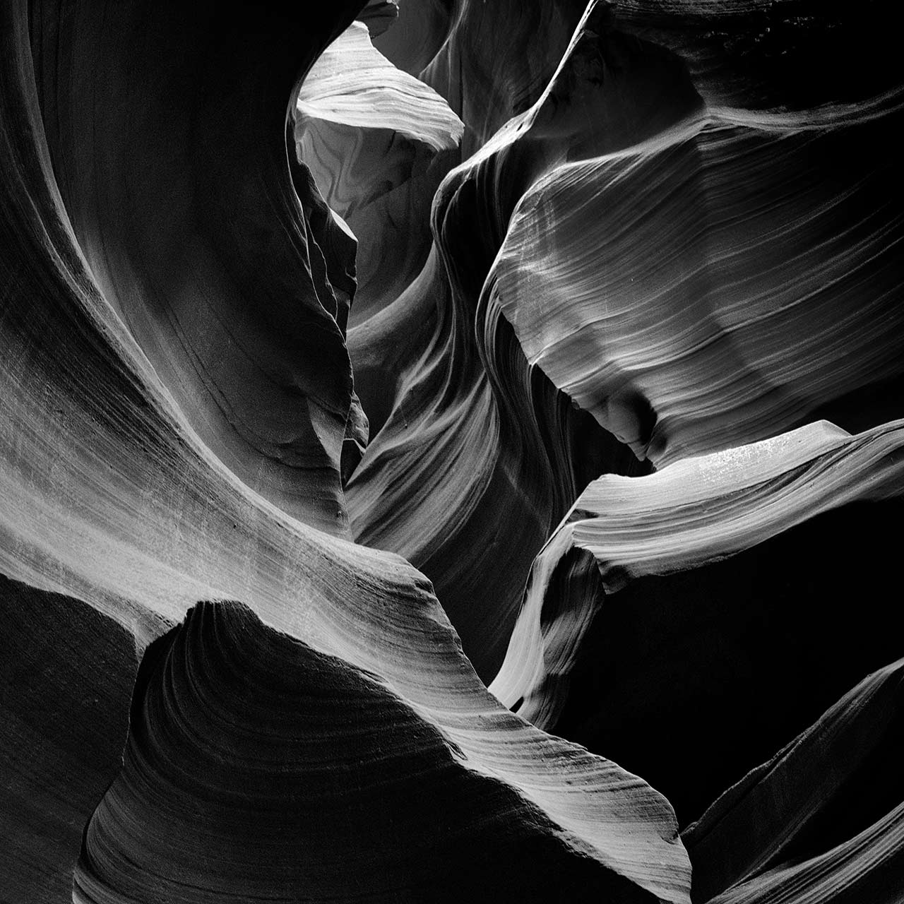 Photograph in black and white of Upper Antelop Canyon in Arizona.