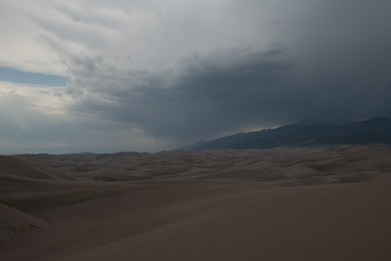 Raw photo of a landscape of Great Sand Dunes in Colorado state. Photo in color by Amar Guillen.