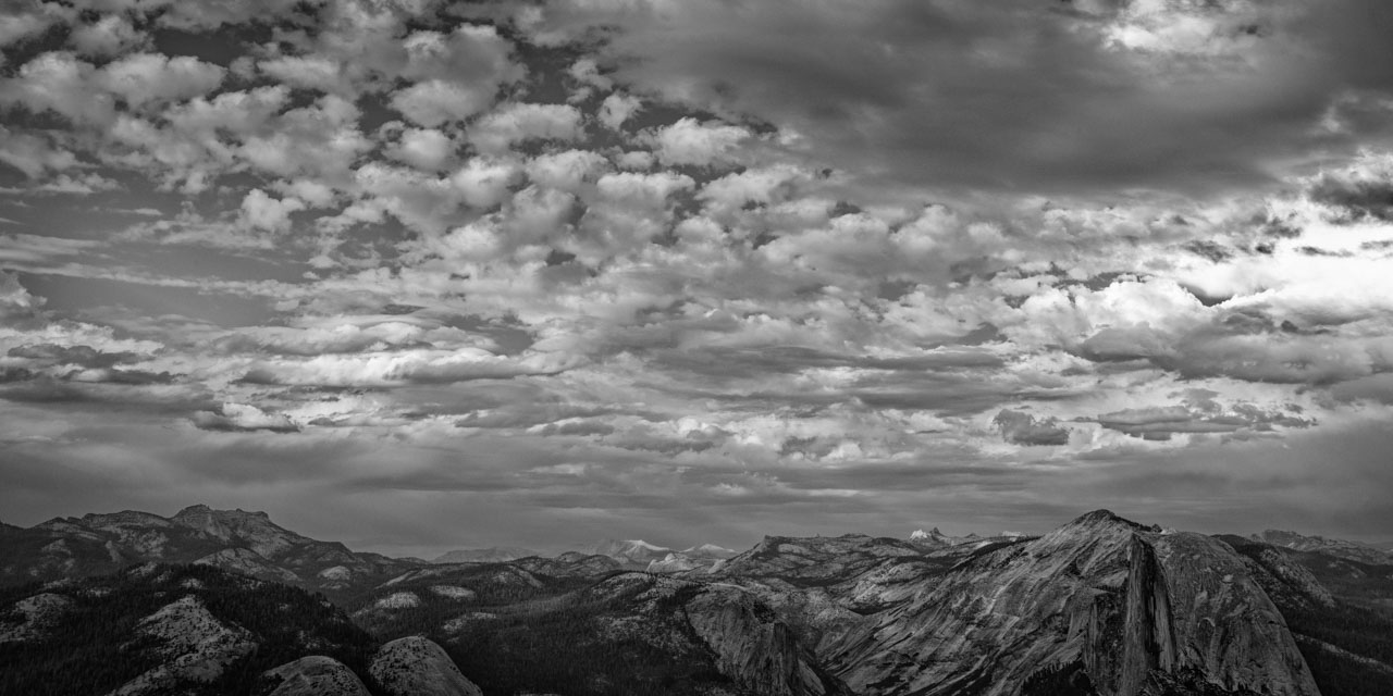A black and white photo of a landscape of Yosemite in California. Photo by Amar Guillen.