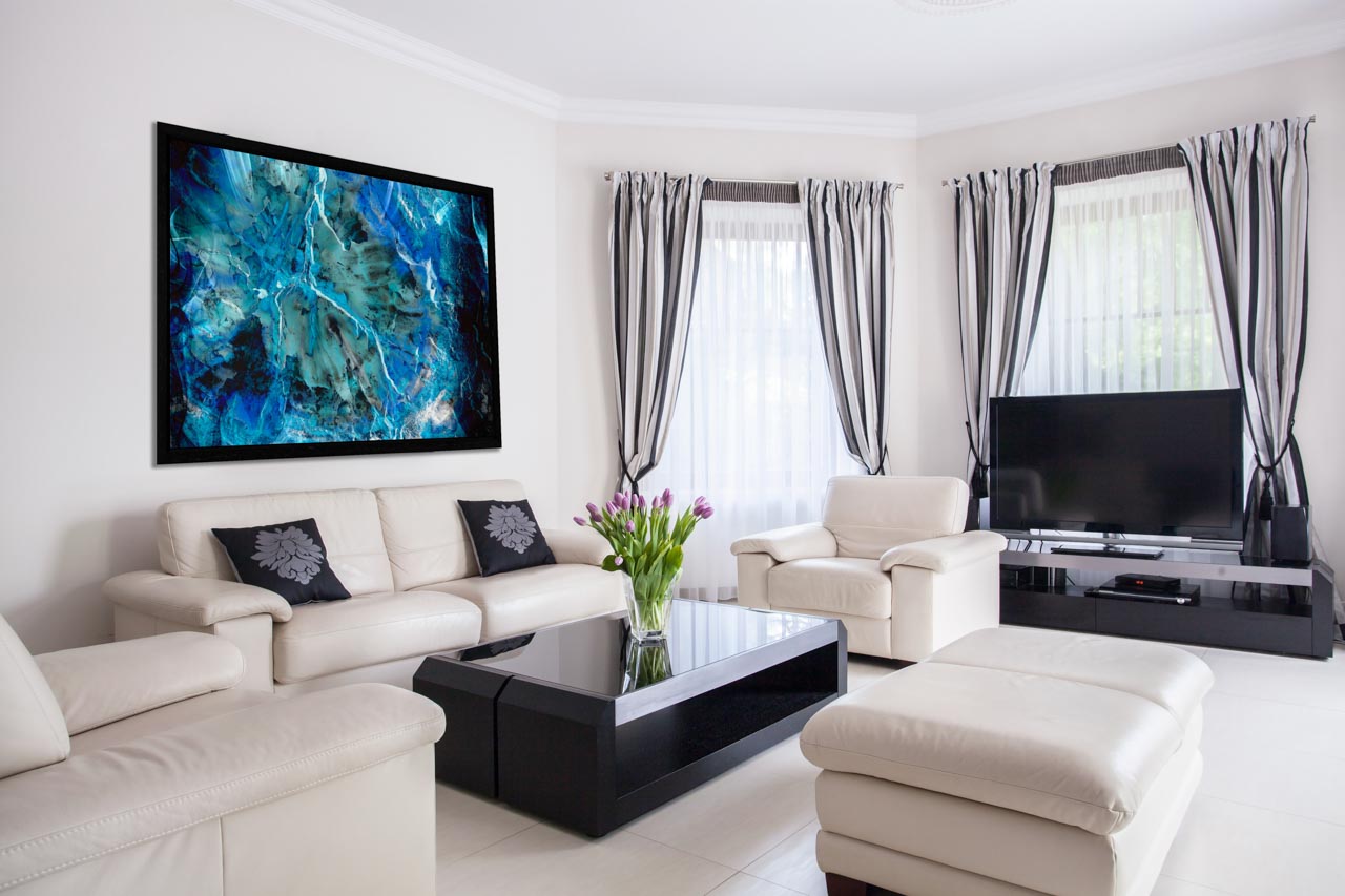 An abstract art photo displayed in a contemporary living room decor.