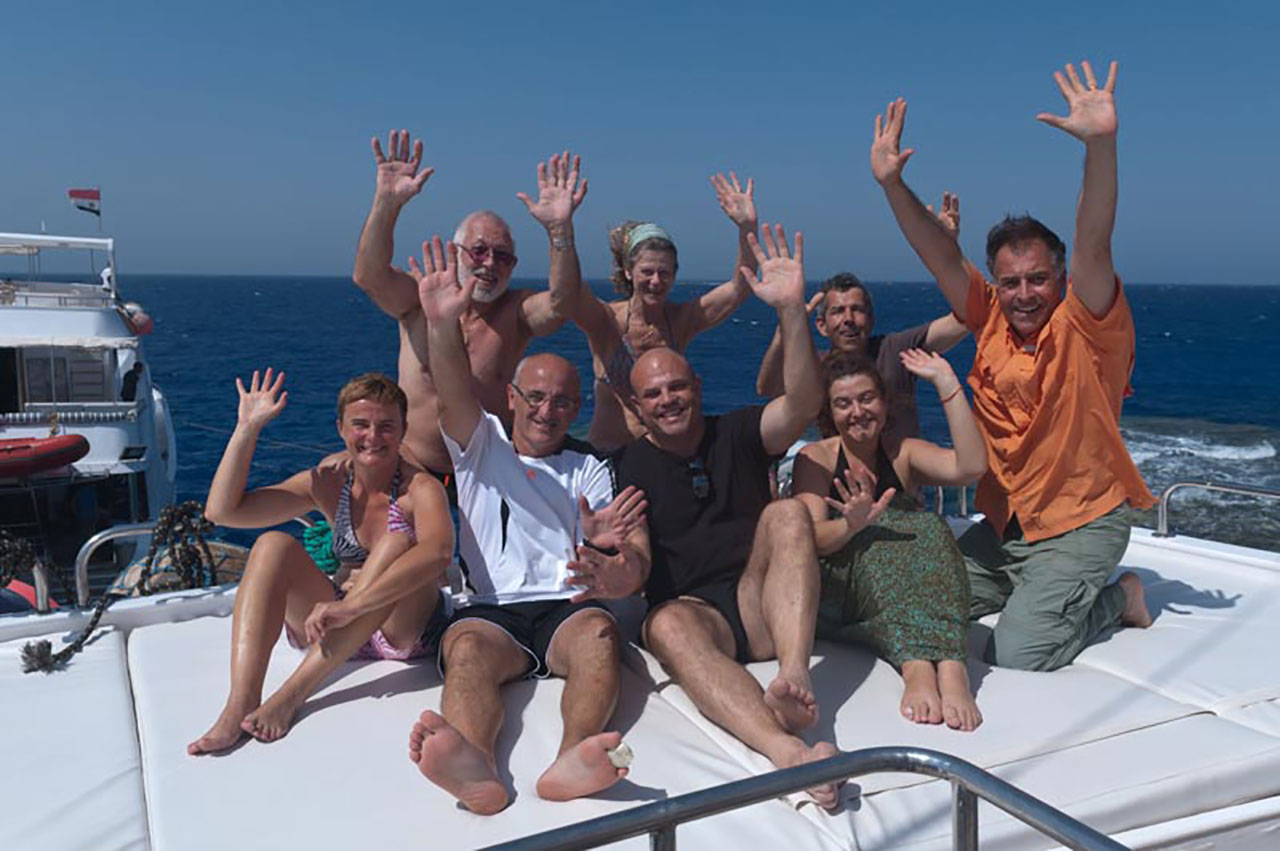 Les participants au stage de photo sous-marine à Saint John's : Anne, Philippe, André, Eveline, Marc, Cécile, Didier et Amar Guillen (à droite).