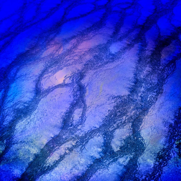 Reflections on the surface of the water at Yellowstone.