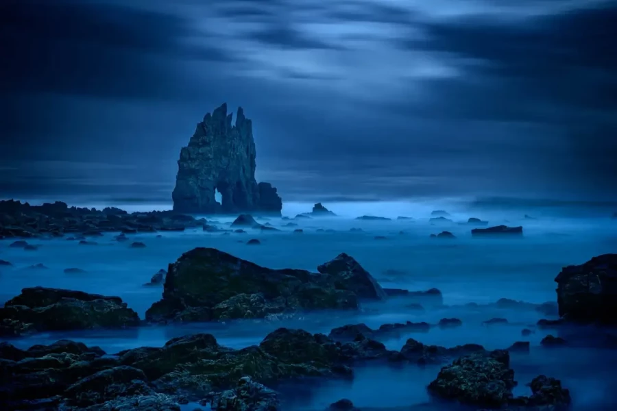 Seascape of the Asturias in Spain. The waves are breaking on the cliffs or the rocks of the coast.