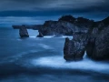 Seascape of the Asturias in Spain. The waves are breaking on the cliffs or the rocks of the coast.