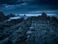 Seascape of the Asturias in Spain. The waves are breaking on the cliffs or the rocks of the coast.
