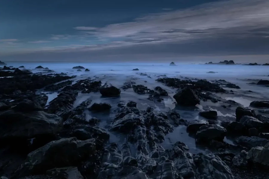 Seascape of the Asturias in Spain. The waves are breaking on the cliffs or the rocks of the coast.