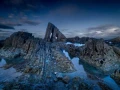 Seascape of the Asturias in Spain. The waves are breaking on the cliffs or the rocks of the coast.