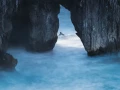 Seascape of the Asturias in Spain. The waves are breaking on the cliffs or the rocks of the coast.