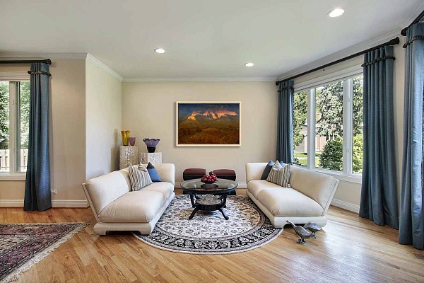 A fine art print of the Grand Canyon, a national park in US, displayed on a wall of a sitting room.