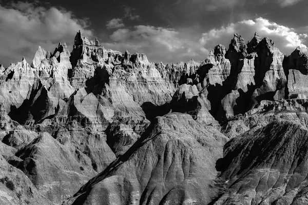 Landscape of the Badlands in South Dakota, United States. Fine art Photograph in black and white by Amar Guillen, photographer artist.